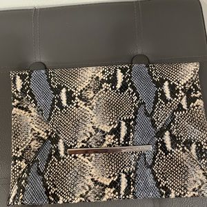 Black / white and blue clutch